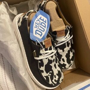 Hey Dude Black and White Cow Print Sneakers
